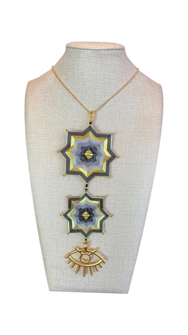 Collar estrella y ojo