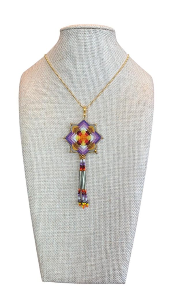 Collar estrella aurora con flecos