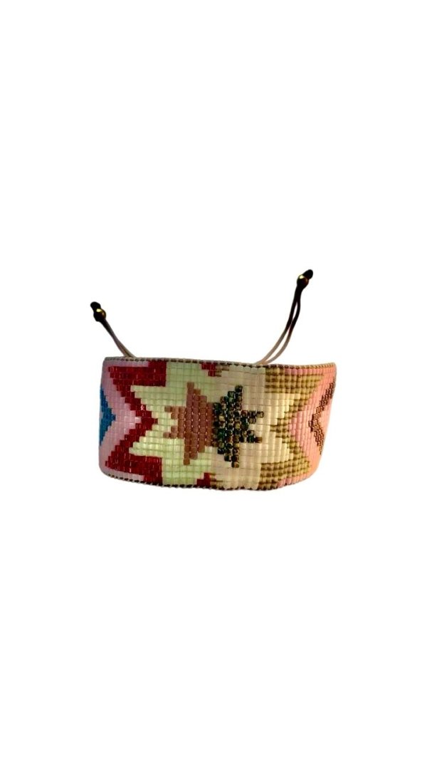 Pulsera ancha tribal en tonos tierra