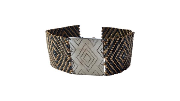 Brazalete étnico negro y dorado