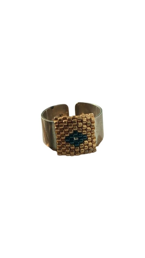 Anillo ajustable con tejido dorado